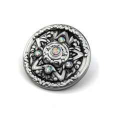 3D metal pin with star and floral pattern and gemstones