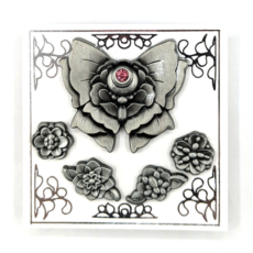 Set of 5 mini pins, one a bow and the other 4 flowers in 3D metal